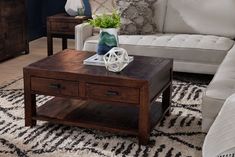 a living room scene with focus on the coffee table