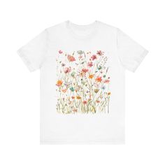 Boho Wildflower Shirt, Wildflowers Cottagecore Shirt, Vintage Boho Wildflower Tshirt, Floral Botanical Shirt Women, Flower Garden Lover Gift ❤ Bella And Canvas Brand Shirts & Unisex Adult Sizing This classic unisex jersey short-sleeve tee fits like an old favorite, offering a perfect blend of comfort and style. Made from soft cotton and featuring a high-quality print, it quickly becomes a go-to item you'll love. Crafted with a lightweight fabric (4.2 oz/yd² or 142 g/m it is both breathable and ideal for layering. ❤ Please note that the rolled sleeves in our photos are for styling inspiration only, and any props shown are not included with your purchase. ❤ PRINT Our shirts are printed using Direct-To-Garment technology, ensuring durability without the risk of cracking or peeling. The ink be Boho Wildflower, Wildflower Shirt, Garden Lover Gifts, Cottagecore Shirt, Botanical Shirt, Women Flower, Styling Inspiration, Brand Shirts, Rolled Sleeves