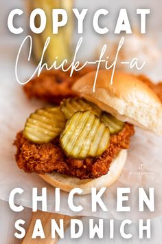 a chicken sandwich with pickles on it and the words copycat chickfia