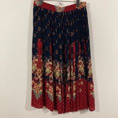 Vintage 1990's Midi Broomstick Skirt, Floral, 100% Rayon , Mixed Print, Collections Etc.  Great Vintage Condition  Size Medium  Length 30 inches  Waist 17 inches across (elastic) *supporting a circular system for a healthy planet  *please ask all questions prior to purchase  *all sales are final Broomstick Skirt, Lafayette La, Collections Etc, Skirt Floral, Mixing Prints, Medium Length, Favorite Outfit, Art Collection, Womens Skirt