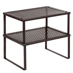 two tiered metal table with perforated design on the top and bottom shelf