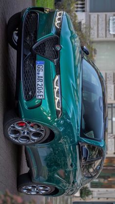 the rear end of a green sports car