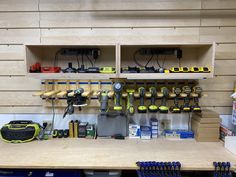 a workbench with tools and other items on it