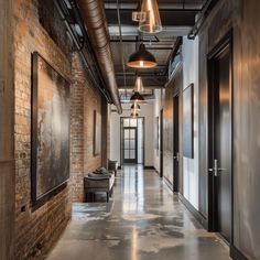 An industrial hallway with exposed brick walls, concrete floors, and metal accents, illuminated by pendant lights hanging from a black metal ceiling3 A Fresh Start, Modular Furniture, How To Design, Fresh Start, Removable Wallpaper