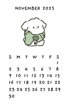 the calendar for november is shown with an image of a dog holding a stuffed animal