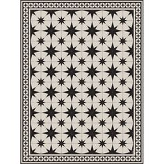 a black and white rug with an intricate design