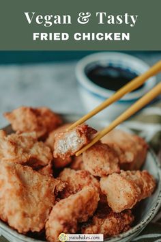 fried chicken on a plate with chopsticks in it and the title vegan & tasty fried chicken