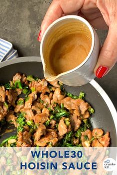 someone is pouring sauce on some chicken and broccoli in a skillet with the words whole 30 hoisin sauce