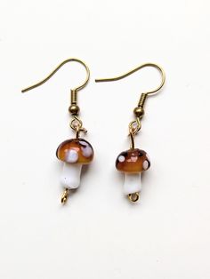 Show your love for mushrooms with these cute brown mushrooms earrings that go great with all your fall outfits! Mushrooms Earrings, Brown Mushroom, Mushroom Earrings, Dream Wardrobe, Halloween Shopping, Jewelry Earrings Dangle, Etsy Earrings, Fall Outfits, Dangle Drop Earrings