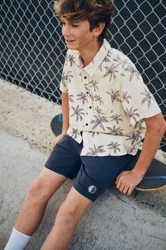 The Mai Tai Shirt features a custom palm print atop a breathable cotton/linen button-up woven shirt. 60% cotton / 40% viscose blend Allover palm print Pocket at left chest Garment washed Clean-finished interior Model is 5'4, 110lbs and wears a size L | Boys Mai Tai Shirt Men's Size Large Cotton in Vintage White by Katin Mai Tai, Palm Print, Steel Blue, Cotton Linen, White Vintage, Button Up, Mens Shirts, How To Wear