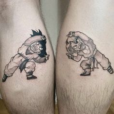 two people with tattoos on their legs, one is holding the other's leg