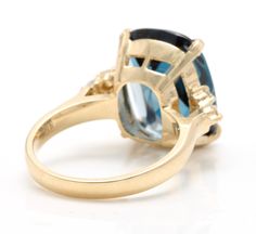 9.35 Carats Natural Impressive LONDON BLUE TOPAZ and Diamond 14K Yellow Gold Ring Suggested Replacement Value $4,500.00 Total Natural London Blue Topaz Weight: Approx. 9.00 Carats London Blue Topaz Measures: 16 x 12mm Natural Round Diamonds Weight: 0.35 Carats (color G-H / Clarity SI1-SI2) Ring total weight: 7.2 grams Disclaimer: all weights, measurements and colors are approximate and may vary slightly from the listed dimensions or as seen in the image. All pictures are magnified to show the sm Blue Topaz Multi-stone Ring For Formal Occasions, Formal Multi-stone Blue Topaz Ring, Multi-stone Blue Topaz Ring For Formal Occasions, Etsy Gold Ring, Yellow Gold Ring, London Blue Topaz, London Blue, Quality Diamonds, Solid Yellow