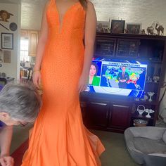 Beautiful Orange Jovani Prom Dress !! Worn Twice. Arms/Sleeves Hemmed, Some Length Taken Off. I’m 5’4 And Normally A 2-4. It Has Some Stretch Orange Prom Dress, Orange Prom Dresses, Jovani Prom, Prom Dress Color, Prom Dresses Jovani, Jovani Dresses, Arm Sleeve, Color Orange, Prom Dress