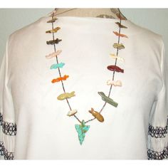 This exquisite vintage Zuni multi stone fetish necklace is a rare and timeless treasure for collectors and jewelry enthusiasts alike. Measuring about 26 inches in length, it features meticulously hand-carved animal fetishes, each representing the revered spirit animals of the Zuni people. Crafted with exceptional artistry and attention to detail, these fetishes are made from turquoise and other stones This phenomenal vintage collectible seamlessly blends cultural significance with artistic beauty, making it a unique and cherished addition to any collection. Vintage Native American Jewelry, Native American Necklace, Bear Carving, Spirit Animals, Native American Rings, Navajo Turquoise, Brooch Jewelry, Timeless Treasures, Lariat Necklace