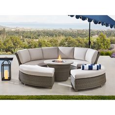 an outdoor patio furniture set with a fire pit