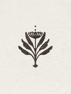 a black and white drawing of a flower