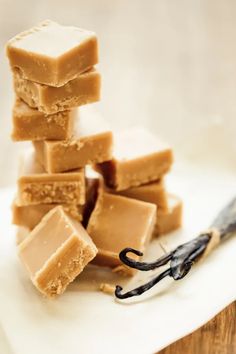 several pieces of fudge cake sitting on top of a white plate