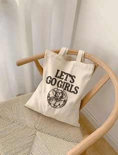 "Calling all coastal cowgirls - this reusable tote bag is features a monochrome cowgirl illustration and classic, retro style typography. Perfect for a beach day or casual everyday use, this canvas bag would also make a perfect gift! Our Canvas tote bags feature... 🖤 100% heavy weight cotton 🖤 Bag measurements of 15\" x 16\" 🖤 Handle measurements of 20\" With lasting durability in mind, we are hopeful this will become a go-to accessory for grocery shopping, errands, and more! When shopping with our store, please remember... -Items typically ship within 2-7 business days after your order is received -Because we custom print each piece after we receive your order, all sales are final and we are unable to accept returns or exchanges. Please note: Due to differences in screen brightness, co Cricut Bags Canvas Totes, Retro Cowgirl Aesthetic, Bachelorette Charleston, Aesthetic Beach Bag, Cowgirl Illustration, Coastal Cowgirl Aesthetic, Canvas Tote Bag Aesthetic, Western Tote Bags, Cowgirl Gifts