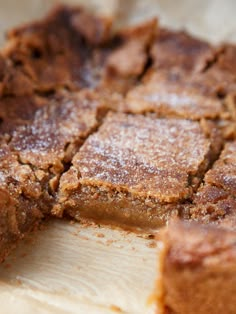 some brownies are cut into squares on a cutting board