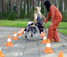 A woman in a wheelchair doing an obstacle course. Adapted Physical Education, Recreational Therapist, Mobility Training, Therapeutic Recreation, Outdoor Gathering Space, Fitness Vision Board, Physical Rehabilitation, Recreation Therapy, Acute Care