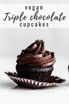 vegan triple chocolate cupcakes on a white plate with text overlay that reads vegan triple chocolate cupcakes