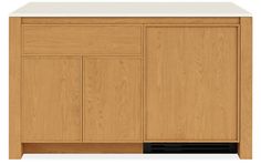 a wooden cabinet with white counter top and drawers