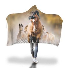 the horse is running through the field hooded blanket