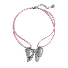 An accessory this irresistible is hard to come by. Meet the 'JENNIE' necklace - featuring our exclusive pink satin cord and a precious bow pendant, you'll never want to take this piece off!  Made with genuine satin cord and stainless steel pendant. Waterproof & rust-free. Available in lengths 14", 15", 16", 18". All lengths include a 2" extension chain. Model is wearing 15". Handmade with love in Los Angeles. Pink Party Jewelry With Butterfly Knot, Pink Party Jewelry With Butterfly Knot Detail, Pink Ribbon Jewelry For Party, Pink Bow Necklace For Party, Silver Adjustable Necklace With Ribbon, Adjustable Necklace With Decorative Bow, Bow Pendant Necklace, Adjustable Pink Ribbon Necklace, Adjustable Pink Heart-shaped Necklaces