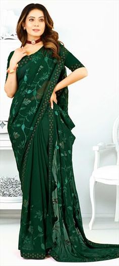 Green color Saree in Georgette fabric with Embroidered, Stone, Thread work Green Georgette Embroidered Fabric For Reception, Green Embroidered Georgette Fabric For Reception, Green Floral Embroidery Fabric For Wedding, Green Floral Embroidered Fabric For Wedding, Green Wedding Fabric With Floral Embroidery, Green Fabric With Intricate Embroidery For Wedding, Wedding Green Fabric With Intricate Embroidery, Green Wedding Fabric With Intricate Embroidery, Green Traditional Drape Fabric For Wedding