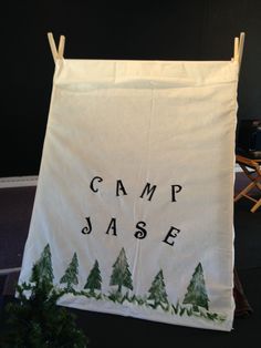 a camp jase banner hanging on a clothes line