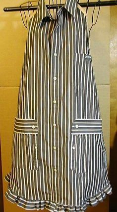 a striped dress hanging on a clothes rack