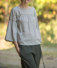 "One more pure linen blouse with pure linen laces. Wide pulled sleeves, square form neck, linen laces at front yoke and at top of sleeves. Blouse for everyday wear to be modern and fashioned, for your holiday and also you can feel comfortable when wear it at home. Item quality - washed. Blouse back length from shoulder till bottom - 23.5\" (60cm). Blouse on picture made in natural undyed flax. Model wears size S. For this item I recommend handwashing program with delicate detergents and no bleac Linen Blouses, Square Form, Hippie Blouse, Style Guru, Natural Boho, Sequin Crop Top, Hippie Shirt, Linen Tank, Trendy Fashion Tops