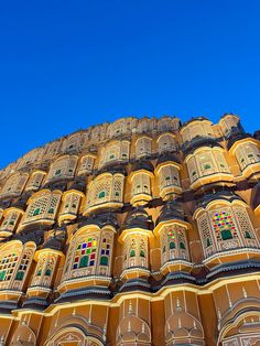 a tall building with lots of windows on it's side