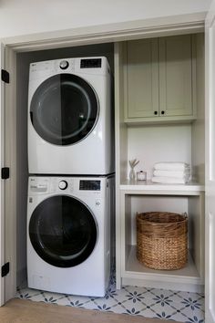 a washer and dryer in a small room