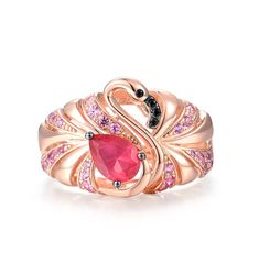 a rose gold ring with pink and black diamonds