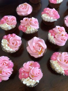 cupcakes decorated with pink and white frosting