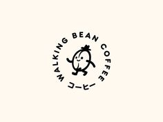 a black and white logo with a monkey on it's head, in the middle of