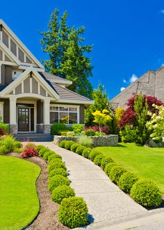 two pictures of the same house with different landscaping