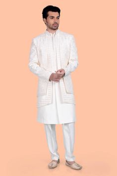 Embrace luxury and elegance with our mens Sherwani S86-S2. Adorned with exquisite mirror and thread work, this garment takes inspiration from the world of art and fashion. Enhance your style and make a statement with our sophisticated and exclusive design. Mens Sherwani, Green Street, Art And Fashion, World Of Art, Bridal Stores, Mirror Work, Thread Work, Grand Opening, Exclusive Designs