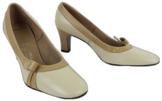 Beige Court Shoes With Padded Heel, Retro Heels With Contrasting Heel Counter And Round Toe, Retro Heels With 4-inch Heel And Medium Width, Retro 4-inch Heel Heels With Medium Width, Beige Heels With Leather Sole Medium Width, Cream High Heel Court Shoes With Leather Sole, Retro Beige High Heels, Vintage Beige Block Heel Shoes, Cream Heels With Wooden Heel And Round Toe