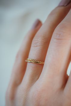 A captivating set of two interlocking bands that blend modern elegance with artisanal craftsmanship.The beauty of this ring lies in its organic shape. This ring will look slightly different from every angle. Whether as a meaningful gift for a loved one or a distinctive addition to your own collection, these interlocking rings are a symbol of unity, resilience, and the beauty found in embracing life's twists and turns. This listing is for one single Interlocking ring set made up of 2 INDIVIDUAL R Thick Twist, Rolling Ring, Rose Gold Wedding Ring, Interlocking Ring, Two Rings, Flat Back Earrings, Bold Rings, Solid Gold Band, 2 Rings