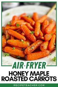 honey maple roasted carrots in a white bowl with text overlay that reads air - fryer honey maple roasted carrots