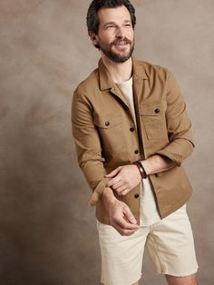 An splendid example of rugged luxury, this magnificent shirt jacket is based on a piece from the archives, crafted here in a soft cotton twill, a delightful contrast to its masculine silhouette.  Point collar.  Chest pockets.  Button front.  Straight