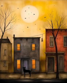 a black cat is standing in front of a house with the sun setting behind it