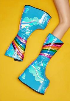 Introducing our new Rainbow Clouds Platform Boots! With a funky rainbow design, these boots will add a pop of color to any outfit. Available in both blue and black options. Step up your shoe game with these unique and playful boots! Material: Microfiber Trendy Blue Mid-calf Boots With Round Toe, Multicolor Round Toe Boots For Party, Multicolor High Ankle Party Boots, Trendy High Heel Boots For Festival, Blue High-top Platform Boots, Trendy Multicolor Party Boots, Trendy Festival Boots With Round Toe, Multicolor Round Toe Platform Boots For Party, Multicolor High-top Party Boots