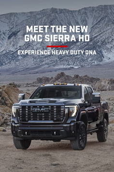 the new gmc sierra hd experience heavy duty ona truck in front of mountains