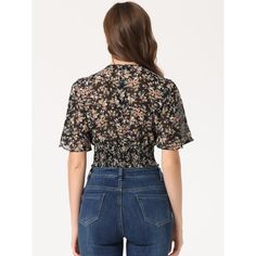 The floral cropped top is a summertime essential with its smocked hem and sweet flare short sleeves. The vintage-inspired floral print blossoms on this chiffon blouse, enhanced by gracefully flared sleeves. It offers a romantic look with its shirred hem, perfect for casual outings, vacations, or daily wear. Pair it with shorts, jeans, or skirts for a sweet look. The model is wearing size XS, and the top is designed for a regular fit. Made from 100% polyester, it is machine washable in cold water Trendy Smocked Short Sleeve Top, Trendy Smocked Top With Short Sleeves, Trendy Short Sleeve Smocked Top, Casual Floral Print Smocked Top, Black Summer Top With Elastic Waistband, Chic Black Smocked Top With Floral Print, Casual Smocked Top With Elastic Waistband, Casual Smocked Top With Short Sleeves And Elastic Waistband, Casual Black Smocked Top For Fall