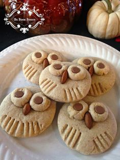 some cookies are sitting on a white plate