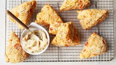 scones on a cooling rack with dipping sauce