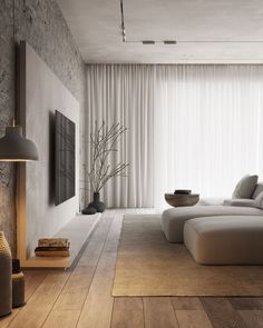 a modern living room with wood flooring and white curtains